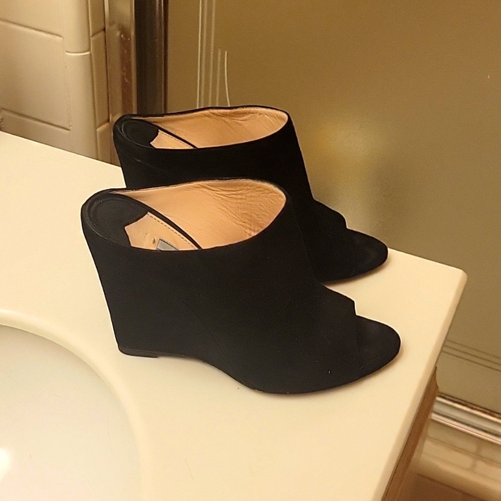 Prada Elegant Black Wedge Mules